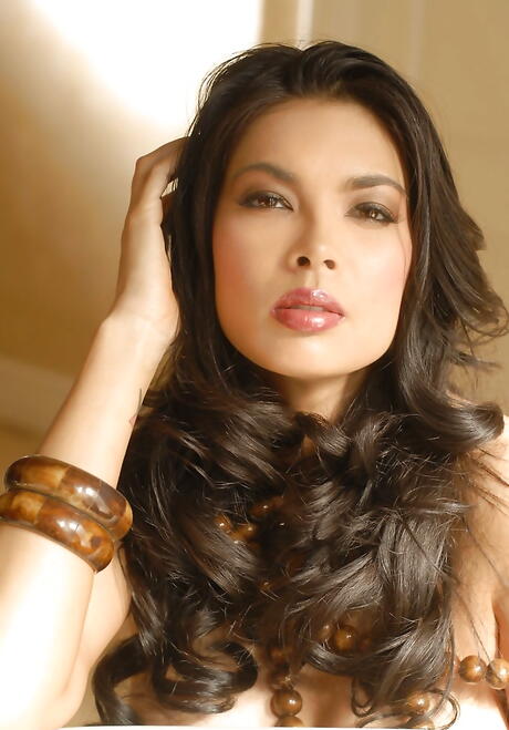 Attractive american brunette milf Tera Patrick revealing big tits and vagina 