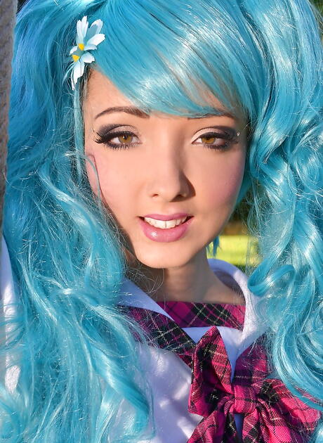 Charming czech babe Lucie Wilde in cosplay outfit bares big boobies and sexy ass outdoor